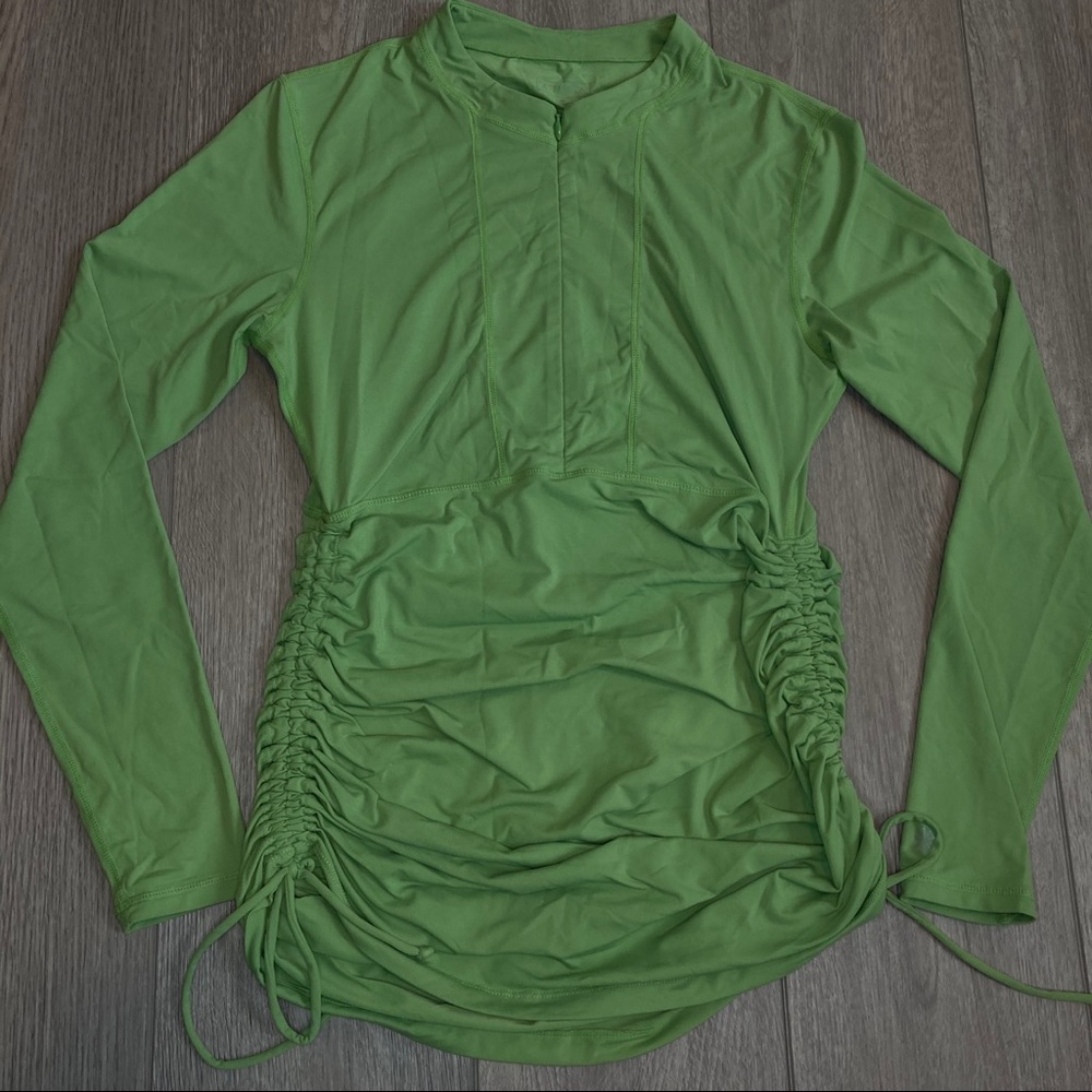 Athleta medium top green long sleeve